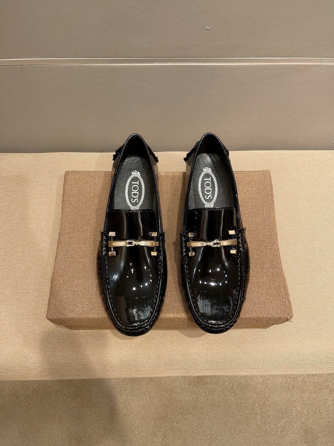 Tod's Glossy Metal Bar Loafers