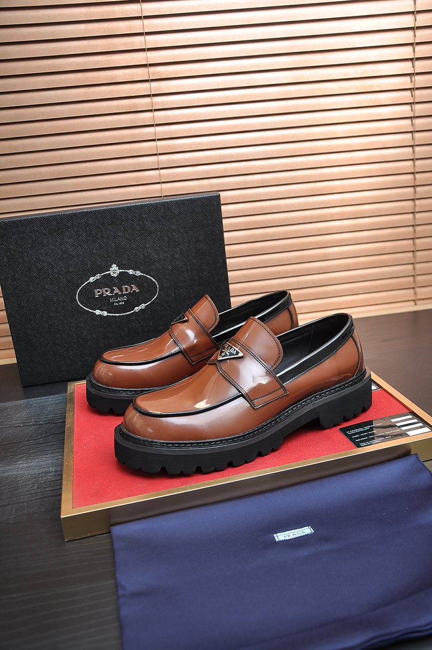 Prada Lug-Sole Strap Loafers